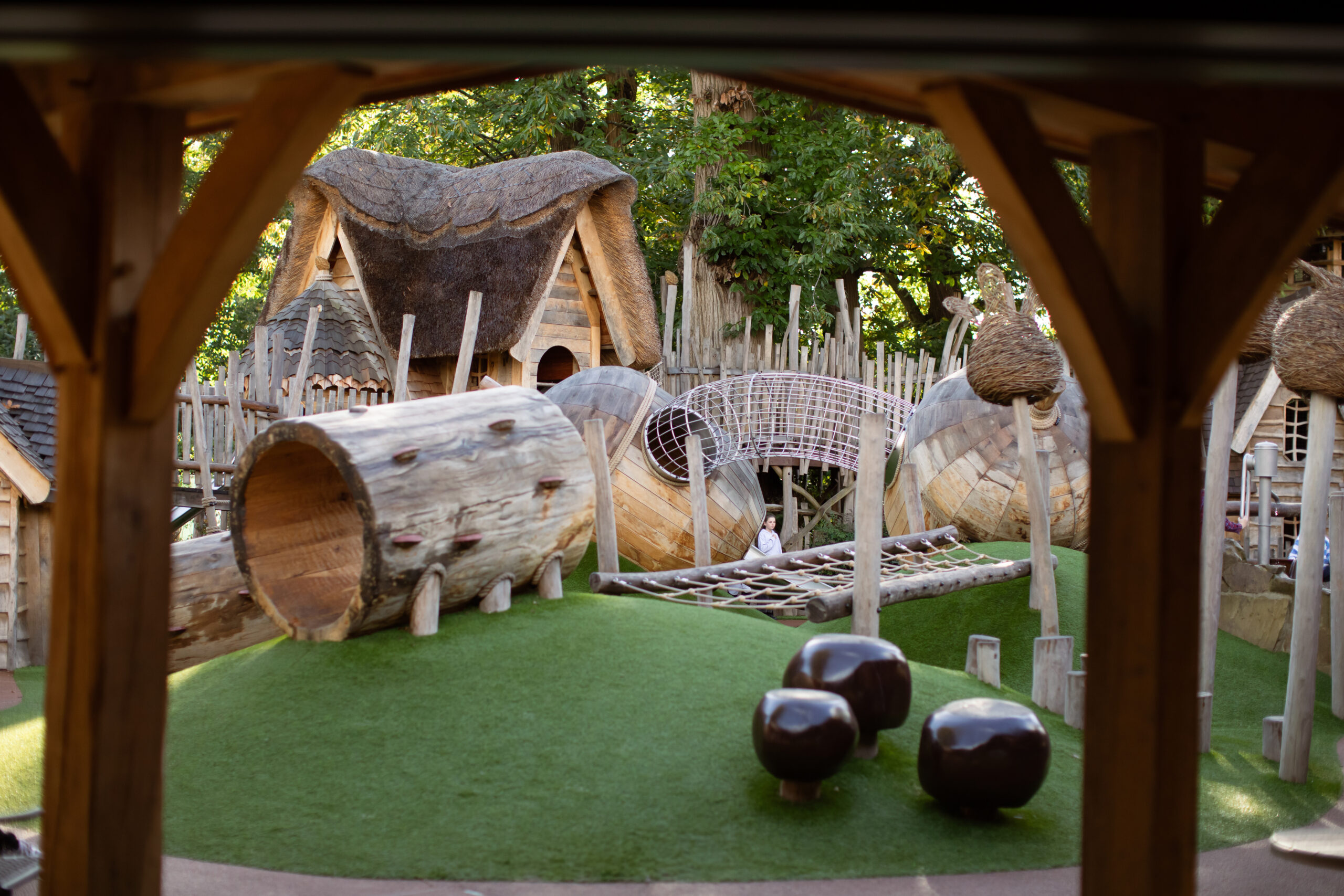 View of the Nimble area at Adventure Play through a wooden arch.